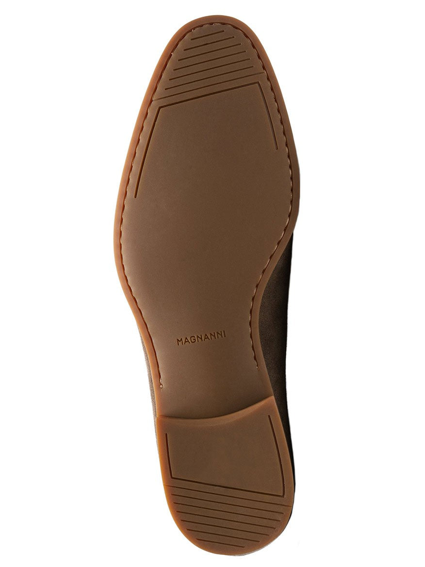 A Magnanni Lecera in Torba Suede sole with the brand name "Magnanni" embossed in the center. The sole, crafted with Magnanni's Línea Flex construction, features ridged sections at the toe and heel for traction.