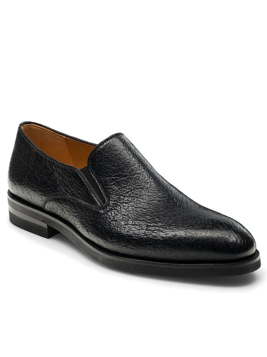 Magnanni Lima in Black leather loafer with a textured finish displayed against a white background.