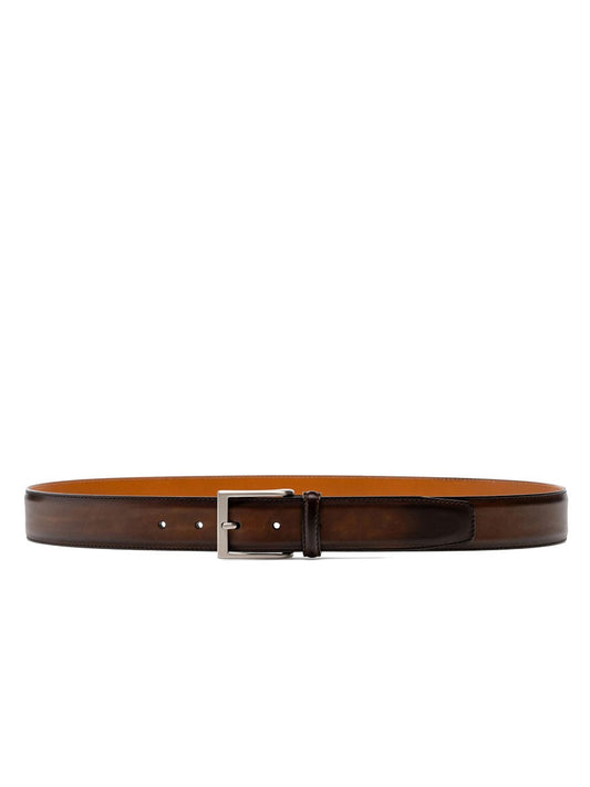 A Magnanni Viento Belt in Tabaco made of calfskin leather with a brushed nickel buckle, showcased on a white background.