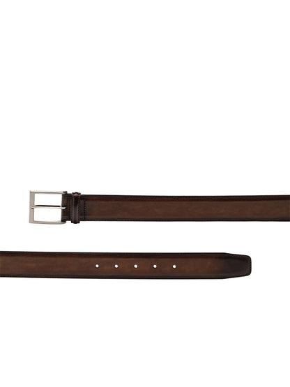 A Magnanni Viento Belt in Tabaco made of rich calfskin leather, featuring a brushed nickel buckle, showcased against a clean white background.
