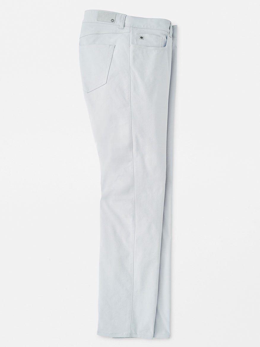 The Peter Millar Performance Five-Pocket Pant in British Grey is displayed on a white background, shown from the back with visible pockets and belt loops.