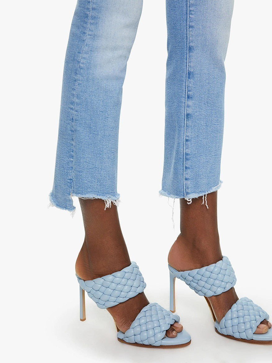Light blue high-heeled sandals paired with Mother Denim The Insider Crop Step Fray in Limited Edition denim jeans.