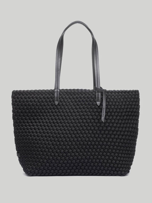 A Naghedi Jetsetter Small Tote in Solid Onyx with two slim handles and a top zip closure, displayed against a gray background.
