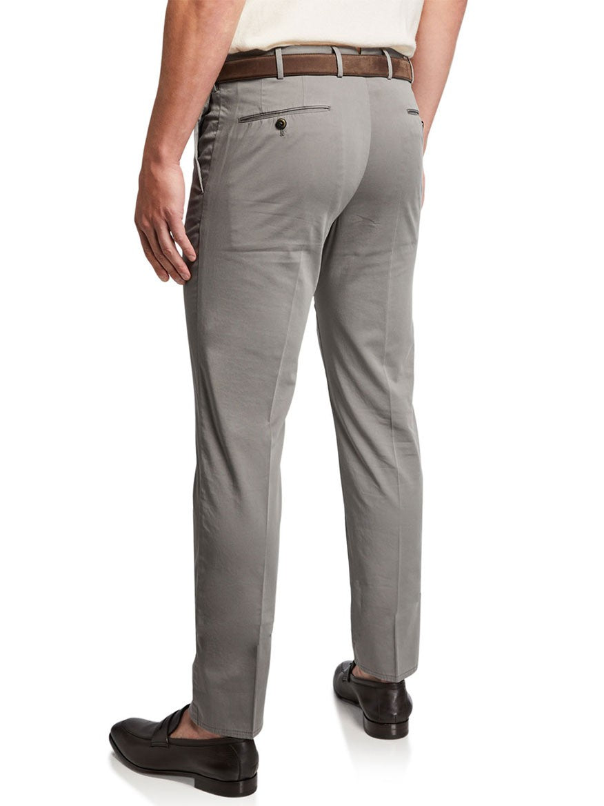 A person wearing PT01 SilkOchino Stretch Trousers in Grey, a brown belt, and black shoes is shown from the waist down and rear view.