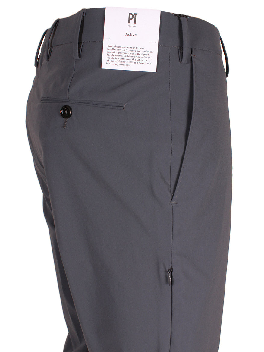 Close-up of the back of a pair of stylish PT01 Kinetic Active Lux Trouser in Steel Grey with a single back pocket and a tag attached to the belt loop above it, perfect for dynamic men.