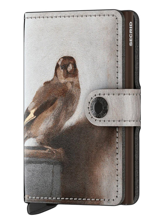 Secrid Miniwallet Art in Goldfinch with a printed design featuring the thinker statue on its cover, enhanced with Cardprotector technology for increased storage capacity.