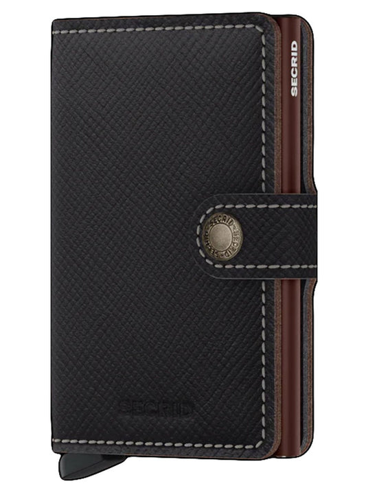 A black and brown Secrid Miniwallet Saffiano in Brown with a textured design, button closure, and RFID protection.