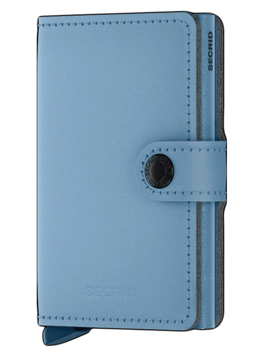 Secrid Miniwallet Yard Powder in Sky Blue with RFID protection and a strap closure.
