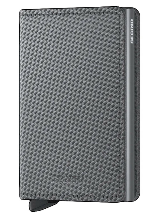 A textured gray Secrid Slimwallet Carbon in Cool Grey with RFID protection and a card protector visible on the bottom right corner.