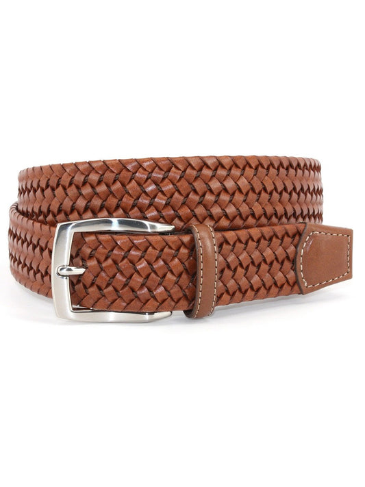 A cognac Torino Leather Italian woven stretch leather belt with a silver buckle, coiled on a white background.