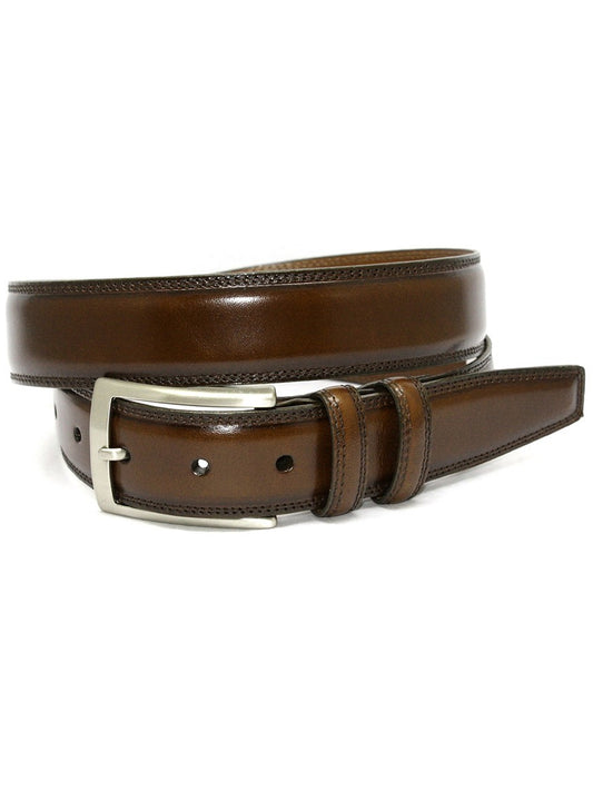 A coiled Torino Leather Hand Stained Italian Kipskin Belt in brown with a satin nickel finished buckle, isolated on a white background.