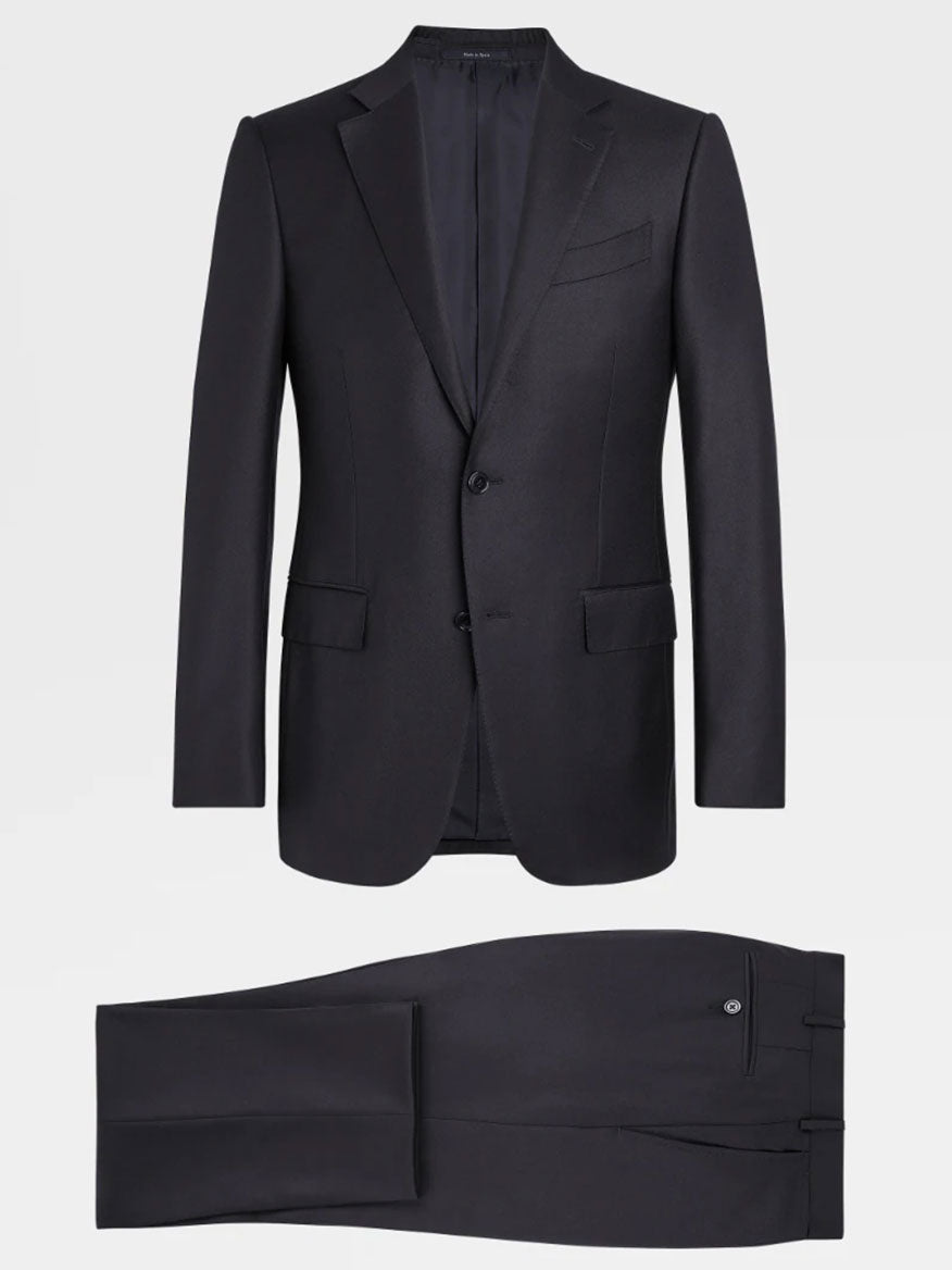 A Zegna Navy Blue Milano Trofeo™ Wool Suit consisting of a single-breasted jacket with a notch lapel and matching trousers, meticulously crafted from luxurious Trofeo™ wool, displayed on a white background.