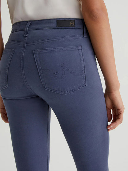 The back view of a woman wearing AG Jeans Prima Cigarette Leg in Blue Note.