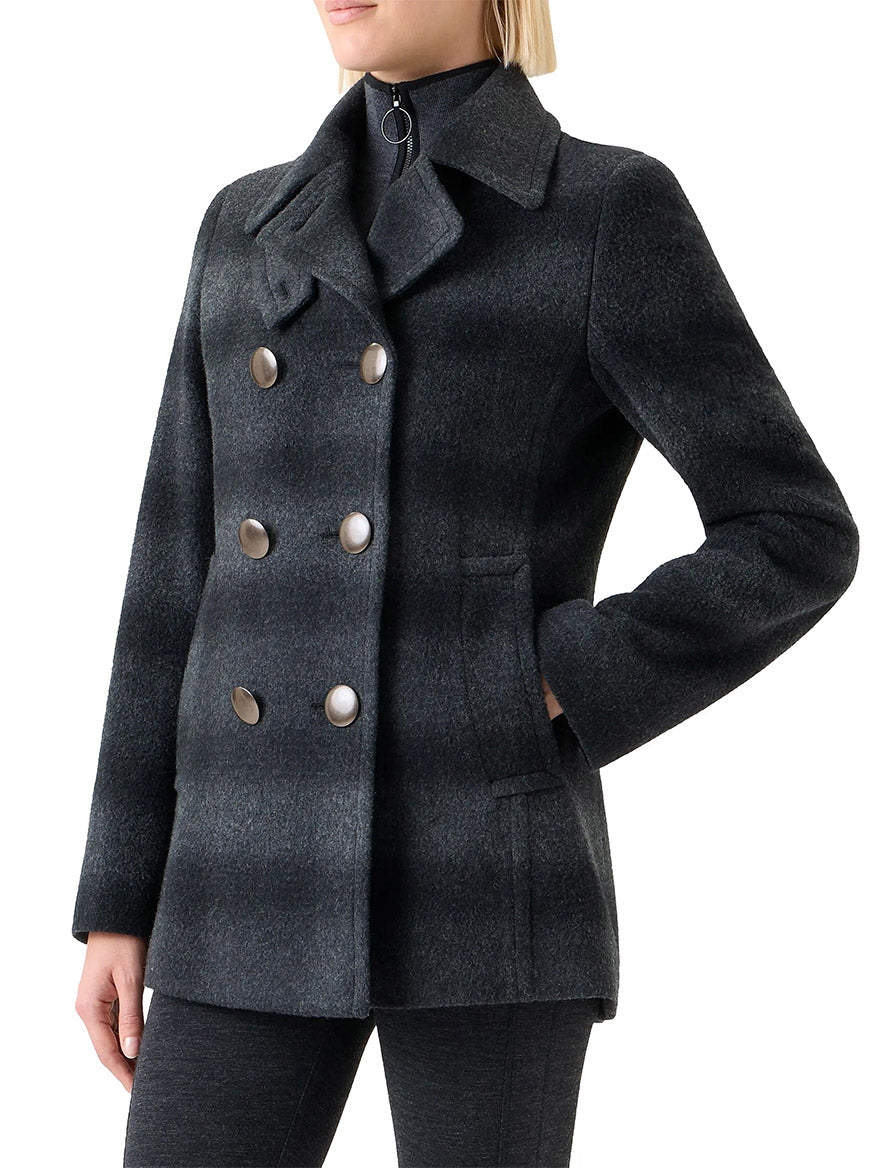 A person wearing the Akris Punto Blurred Check Wool Pea Coat in Charcoal/Black, styled with dark pants.
