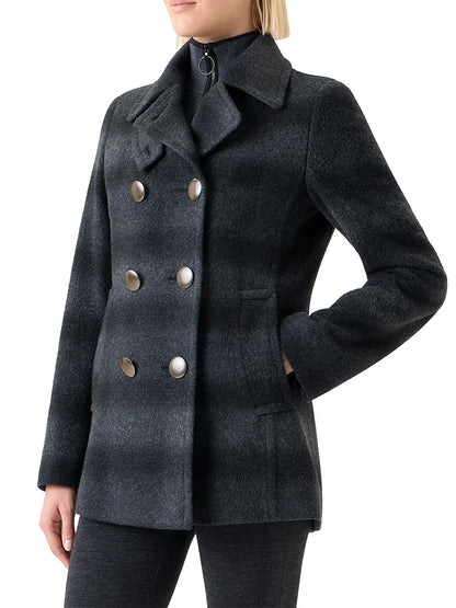 A person wearing the Akris Punto Blurred Check Wool Pea Coat in Charcoal/Black, styled with dark pants.