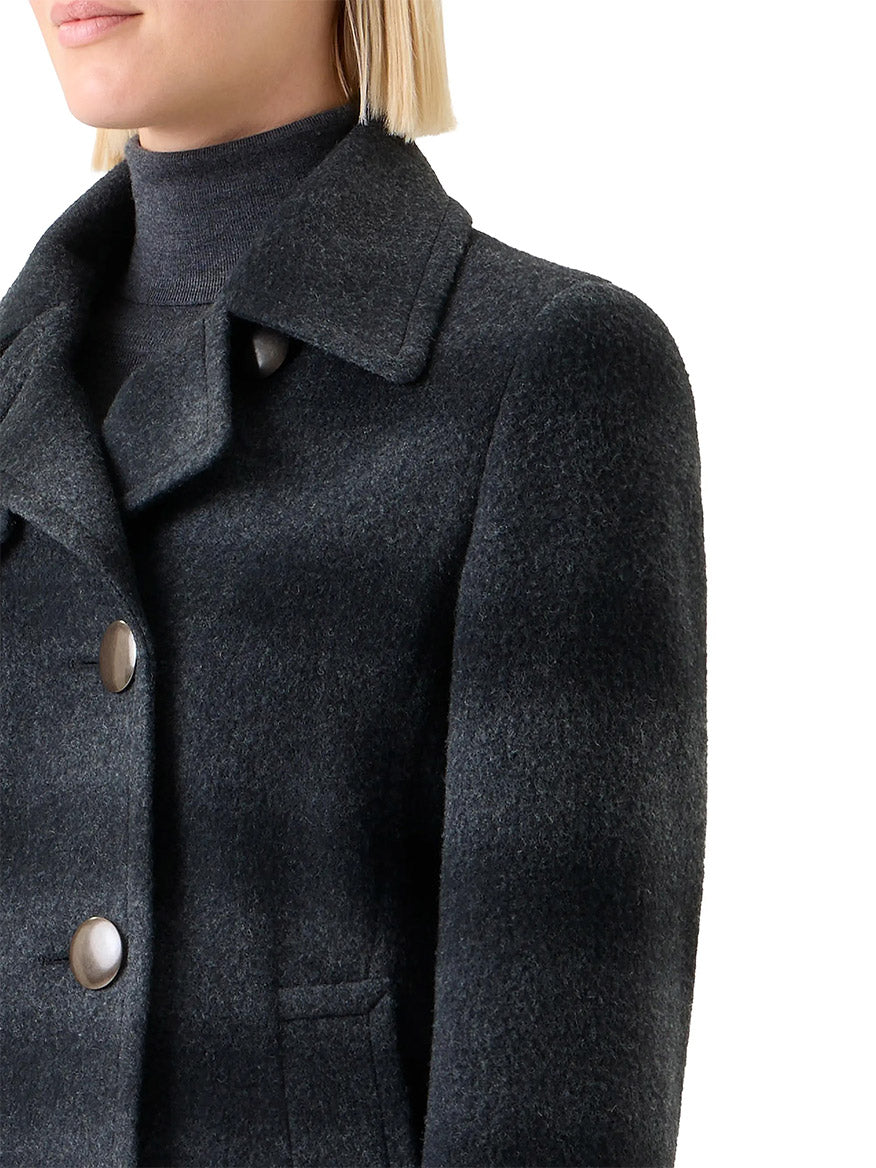 A person with a bob haircut wears an Akris Punto Blurred Check Wool Pea Coat in Charcoal/Black over a turtleneck; only the upper torso is visible.