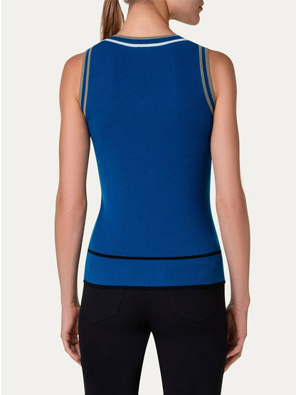 The back view of a woman wearing a blue Akris Punto Colorblock Rib Knit Tank Top in Ink Multi.