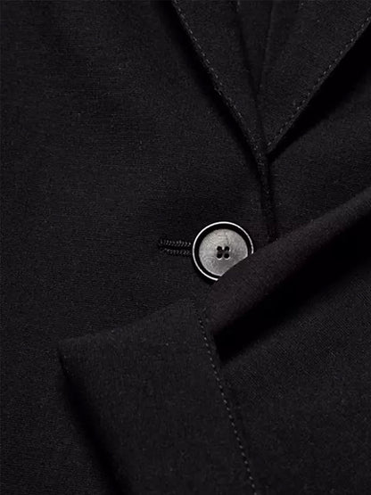 A close up of the Akris Punto Elements One-Button Jersey Blazer in Black.