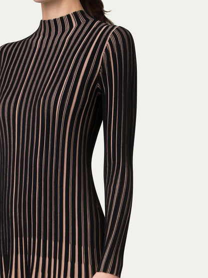 Person wearing a black and beige striped, long-sleeve, high-neck top photographed from the mid-torso to the neck looks seamlessly paired with the Akris Punto Ribbed Fit-and-Flare Dress in Black/Caramel.