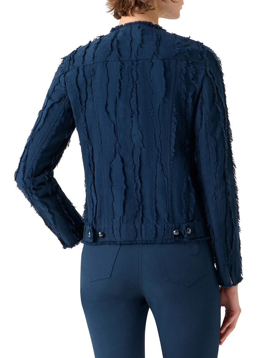 Model shown from the back wearing the Akris Punto Fringed Wave Jacquard Jacket in Dark Blue, featuring raw-edge vertical stripes, buttoned hem tabs, unique textured fringe, and matching fitted pants.