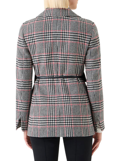 A person with blonde hair, seen from behind, wears the Akris Punto Glencheck Wool-Blend Jacket in Black/Cream/Vermillion paired with black pants.