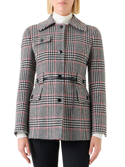 A person wearing the Akris Punto Glencheck Wool-Blend Jacket in Black/Cream/Vermillion, styled with a leather belt, stands against a white background.