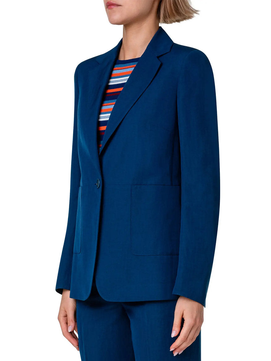 A woman wearing a blue Akris Punto Notched Lapel One-Button Blazer in Ink.