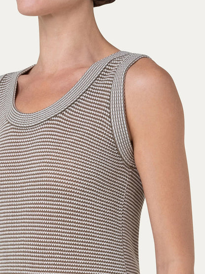 A woman wearing an Akris Punto Ribbed Sleeveless Wool Knit Top in Nutmeg/Cream.