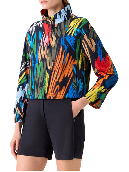 Person wearing the Akris Punto Scribble Print Drawstring Jacket in Black Multi with black shorts.