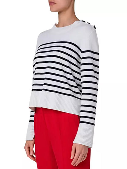 A woman wearing an Akris Punto Striped Crew Sweater With Snap Shoulder in Cream/Black combined with a cashmere blend.