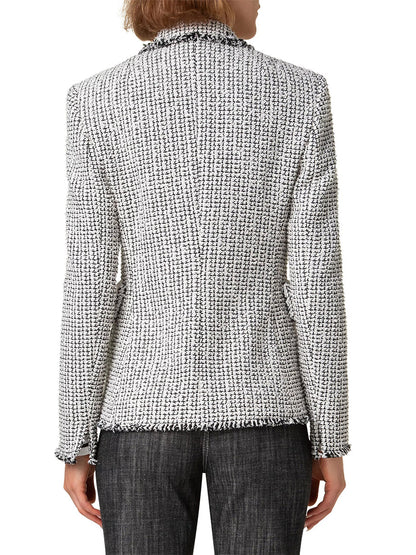 Rear view of a person wearing an Akris Punto Tweed Illusion Double Breasted Jacket in cream/black, paired with dark trousers against a plain white background.