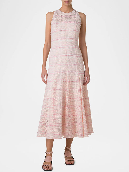 Against a plain background, a person wears the Akris Punto Sleeveless Tweed Organza Midi Dress in Pale Pink Multi with brown flat sandals, highlighting its fit-and-flare silhouette.