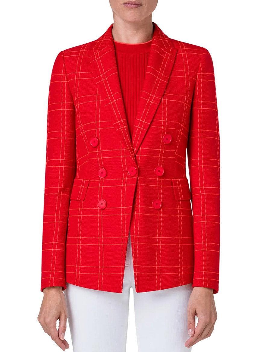 A woman wearing the Akris Punto Window Check Blazer in Red, made of fabric.