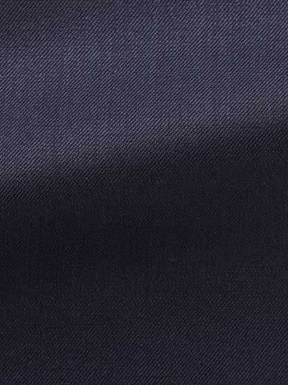 Close-up of Atelier Munro Midnight Blue Twill 4-Season Wool Stretch Suit fabric, featuring a subtle diagonal weave and soft lighting that highlights its refined texture—perfect for a modern, versatile suit.