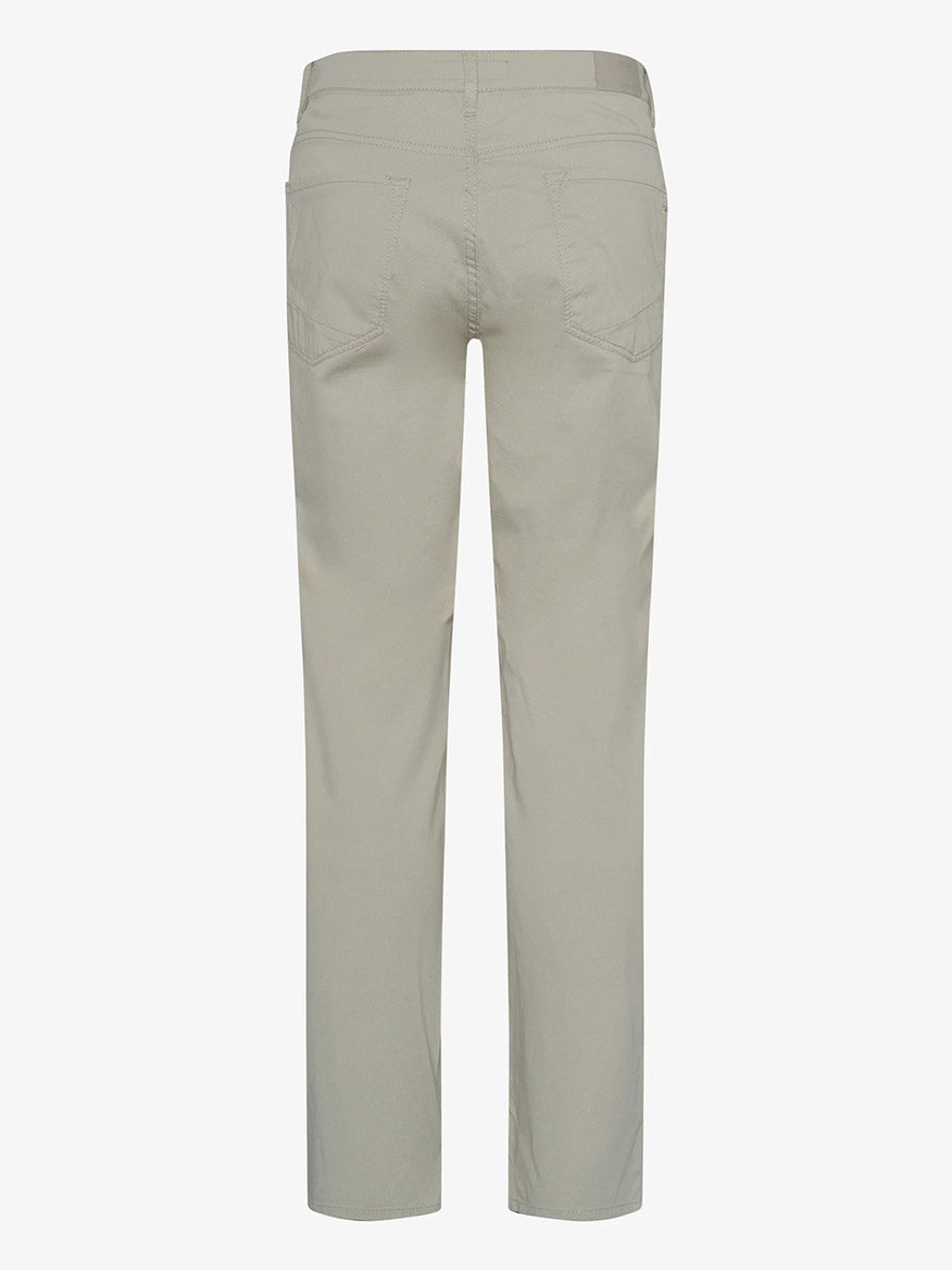 Back view of a pair of Brax Chuck U Ultralight beige trousers with basketweave cotton blend on a plain background.