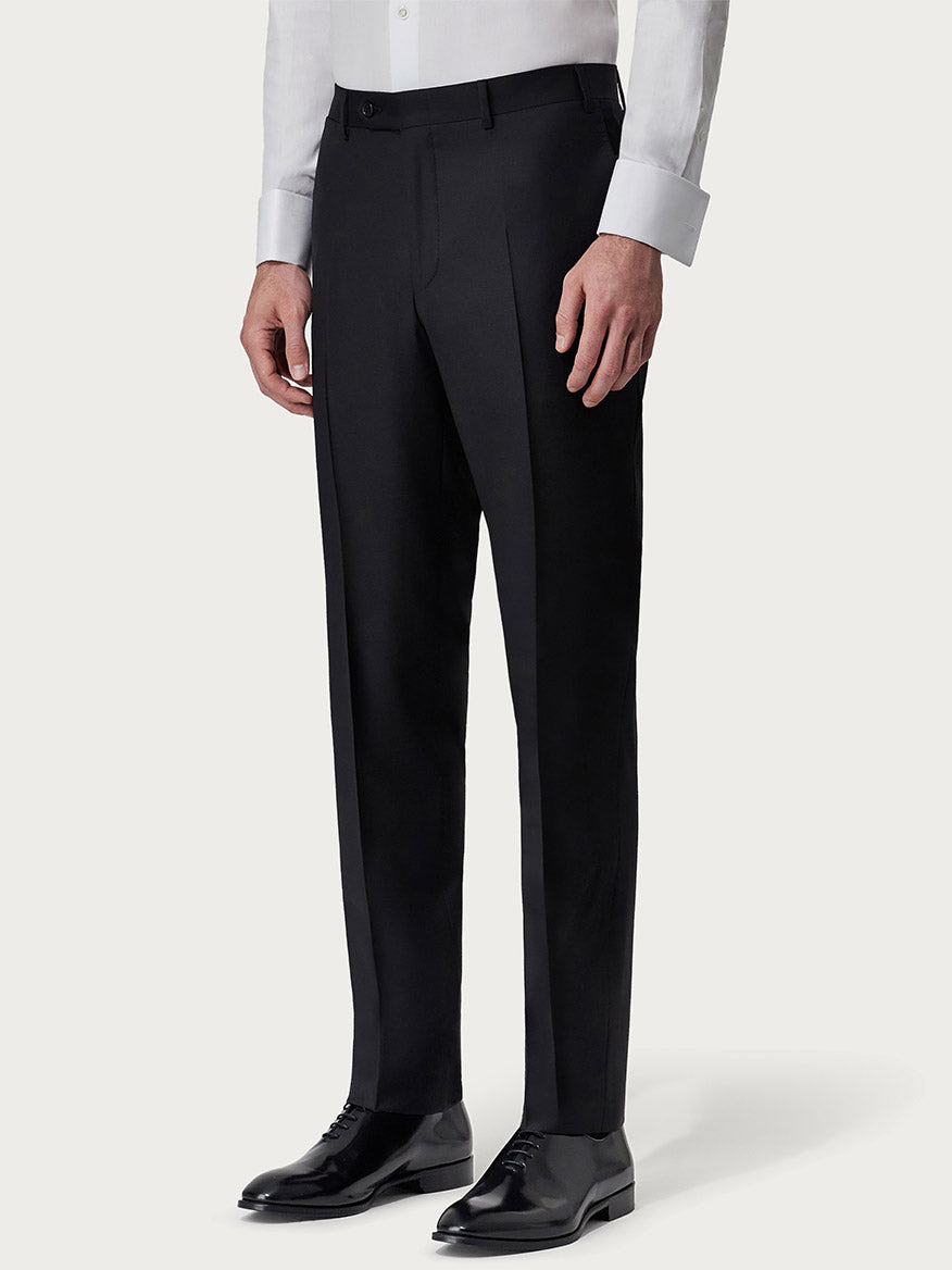 A man wearing a white shirt and Canali Siena Contemporary Black Wool Suit trousers paired with glossy black dress shoes, standing against a plain background. Only the lower half is visible.