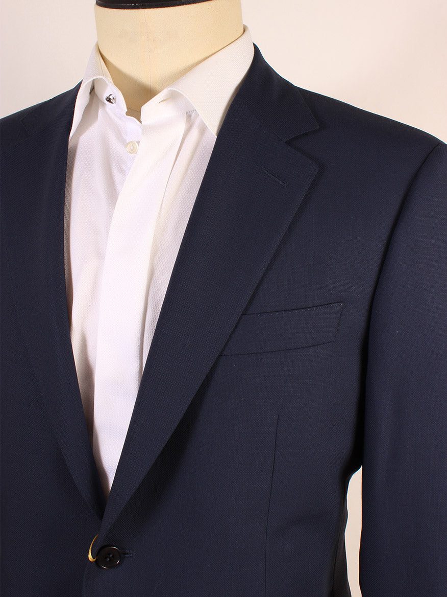 Mannequin dressed in a Canali Siena Wool Sport Jacket in Dark Blue with notched lapels and a white shirt, focusing on the upper torso and detailing of the suit jacket.