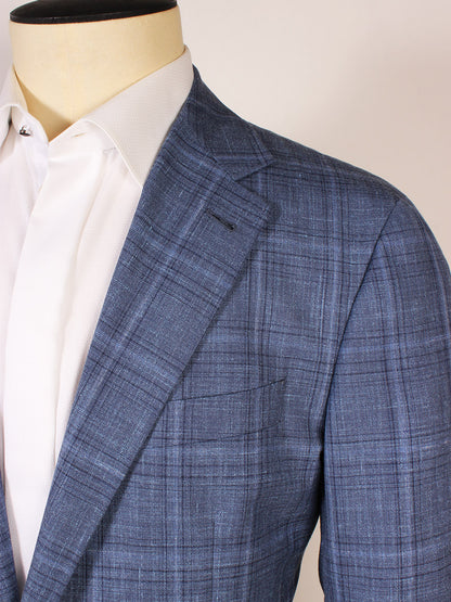 Close-up of a person wearing the Canali Flap Pocket Sport Jacket in Blue Plaid over a white dress shirt, shown from shoulders to mid-torso.