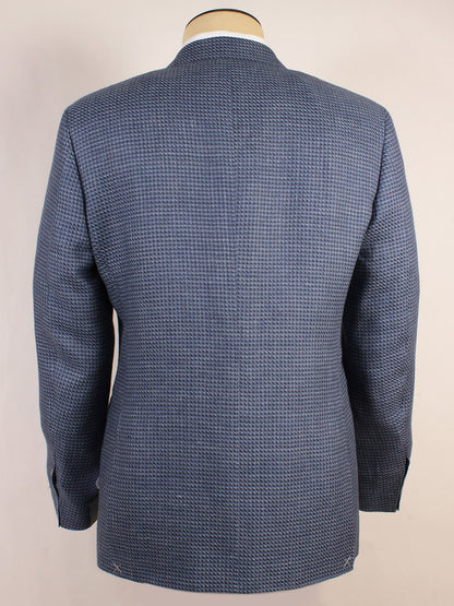 The Canali Flap Pocket Sport Jacket in Mid Blue, crafted from a linen blend in Italy, is shown from the back on a mannequin against a plain light background.