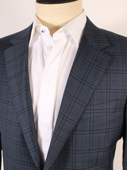 A mannequin dressed in a white shirt and a Canali Wool Sport Jacket in Blue Green Navy Plaid with notched lapels.