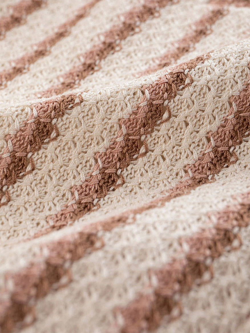 Close-up of the Circolo 1901 Slim Striped Long Jacket in Naturale Knitted, showing its textured fabric with alternating beige and light brown diagonal stripes.