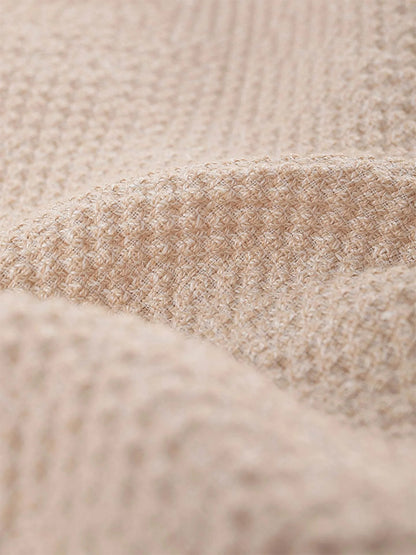 Close-up of beige linen bistretch fabric with a soft, waffle-like texture, featured in the Circolo 1901 Cropped 4-Pocket Jacket.