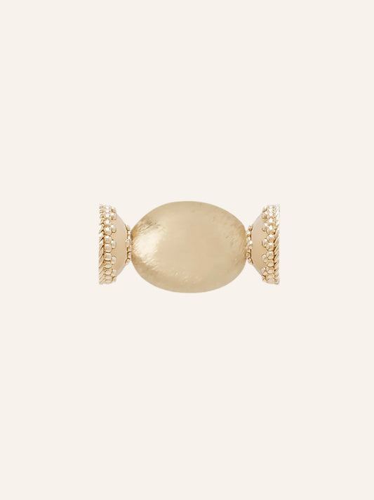 Clara Williams Gold Rush Teardrop Mini Centerpiece featuring a smooth, teardrop-shaped center and textured edges, crafted in 14K yellow gold and displayed against a plain, light-colored background.