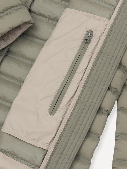 Close-up of the Colmar Underscore Down Zip Jacket in Muddy Arizona, showcasing a vertical zippered chest pocket and front zipper; this water-repellent jacket delivers both style and functionality.