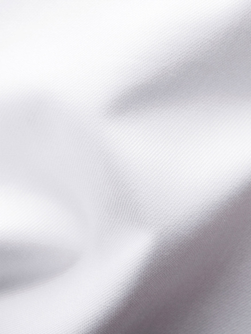 Close-up of signature twill fabric from the Eton Classic Fit Solid Signature Twill Dress Shirt in White with Navy Details, highlighting its visible texture and soft folds.