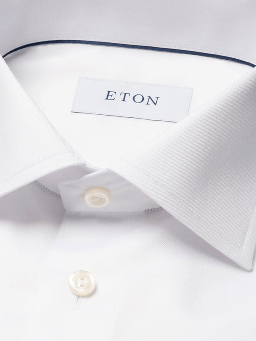 Close-up of the Eton Classic Fit Twill Dress Shirt in White, featuring a spread collar, white buttons, and a visible Eton brand label inside the collar.