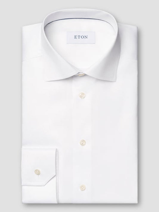 The Eton Classic Fit Twill Dress Shirt in White features long sleeves, a classic collar, and button cuffs—an exceptionally versatile choice for any occasion.
