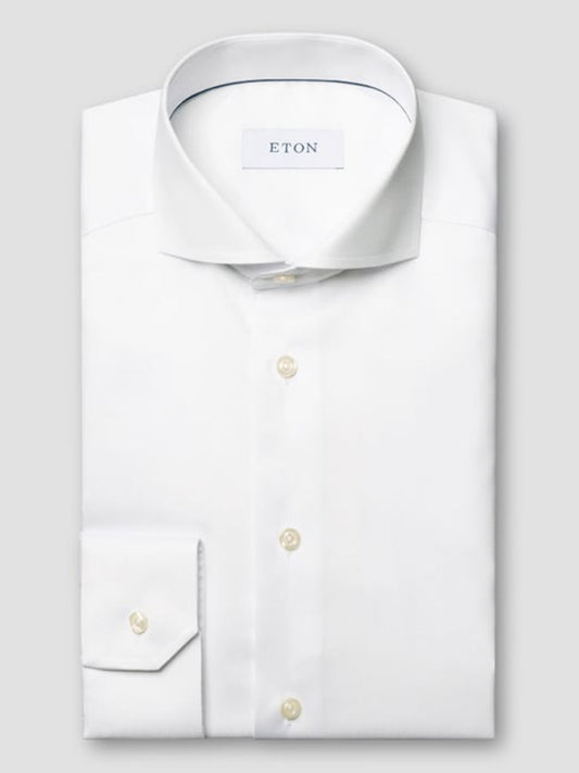 The Eton Contemporary Fit White Extreme Cut Away Dress Shirt features crisp twill fabric, an extreme cut away collar, button cuffs, and the signature Eton label inside the collar.