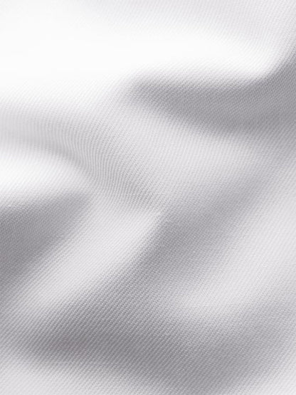 Close-up of the white signature twill fabric with visible texture and soft ripples—a hallmark of the Eton Slim Fit Extreme Cut Away Dress Shirt in White.