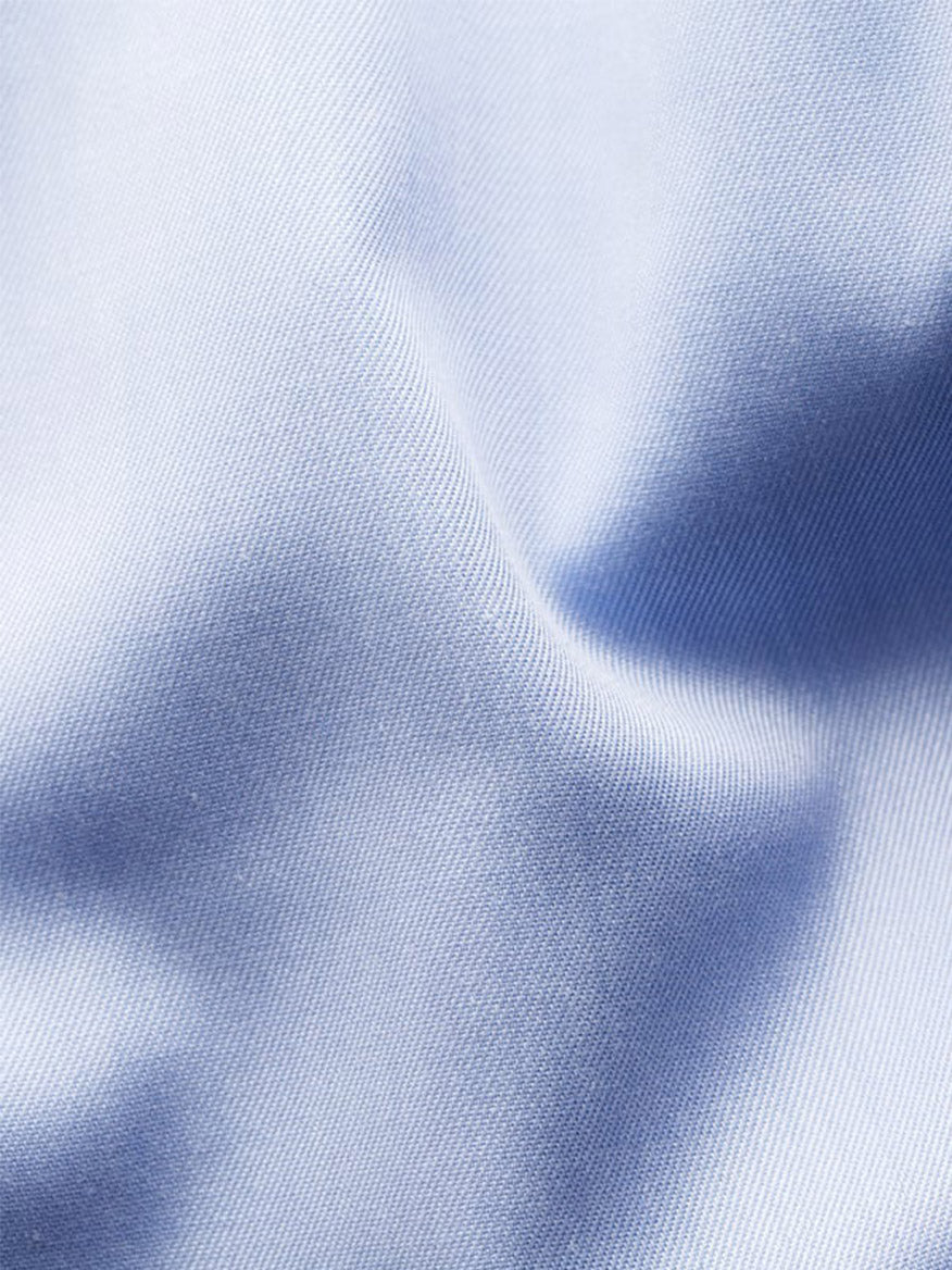 Close-up of the Eton Slim Fit Extreme Cut Away Dress Shirt in Sky Blue, showcasing fine texture and gentle folds—demonstrating the refined quality and craftsmanship of this premium shirt.